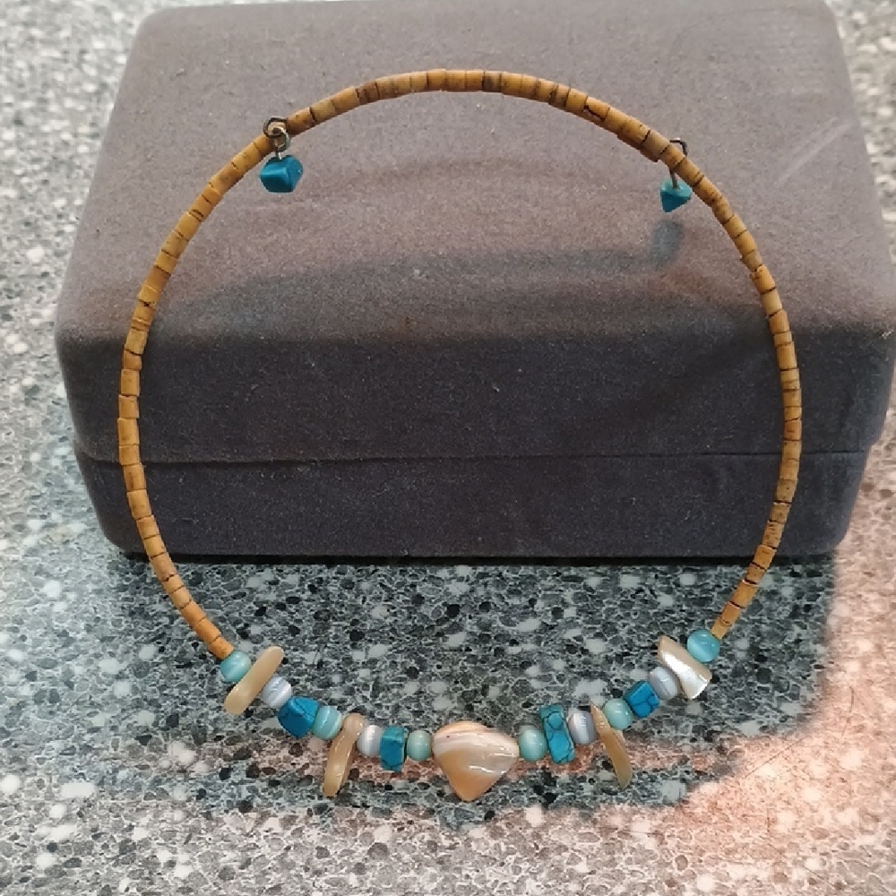Elegant Beaded Necklace with Turquoise and Tan Accents
